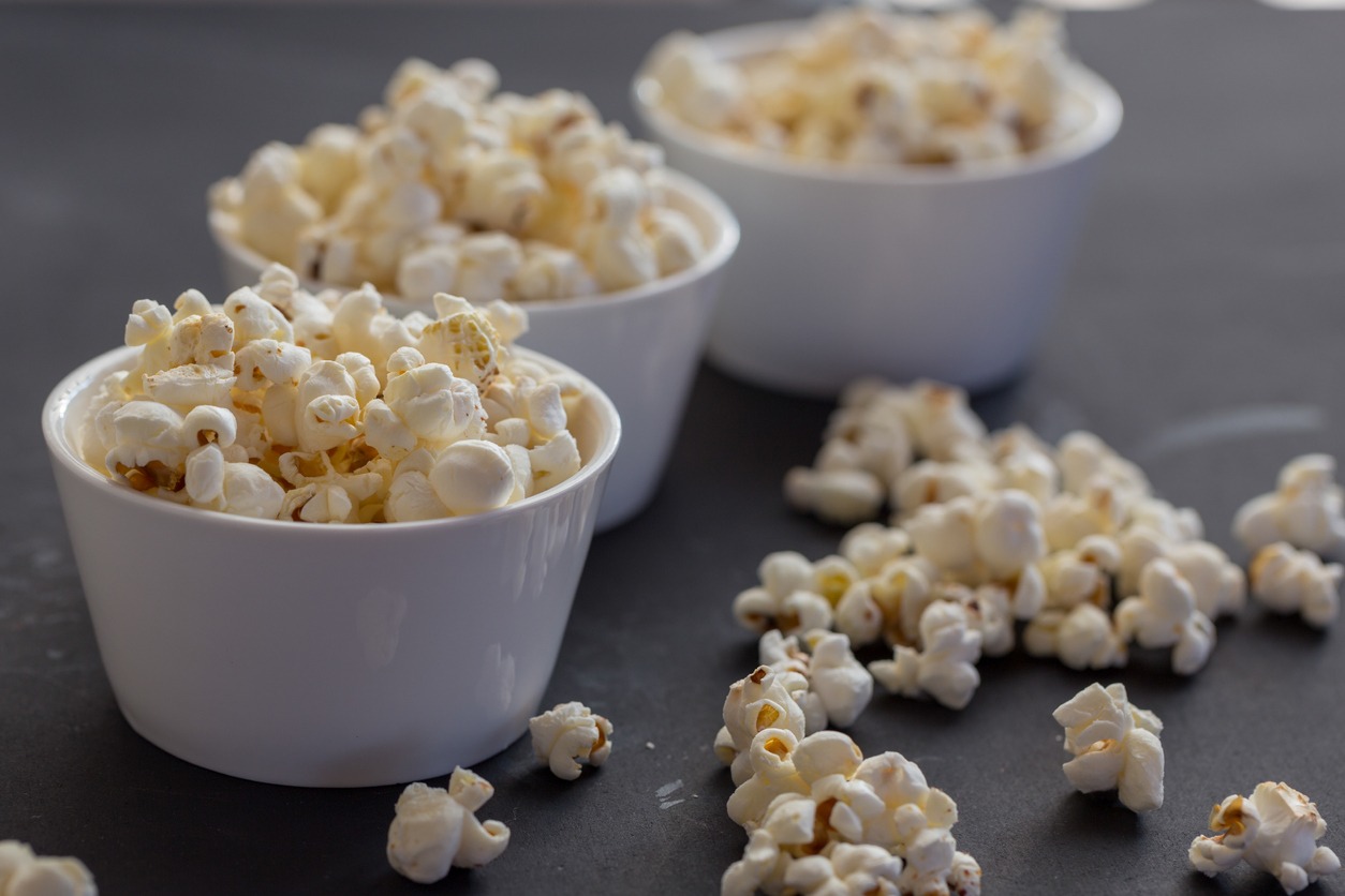 Popcorn on black wooden table