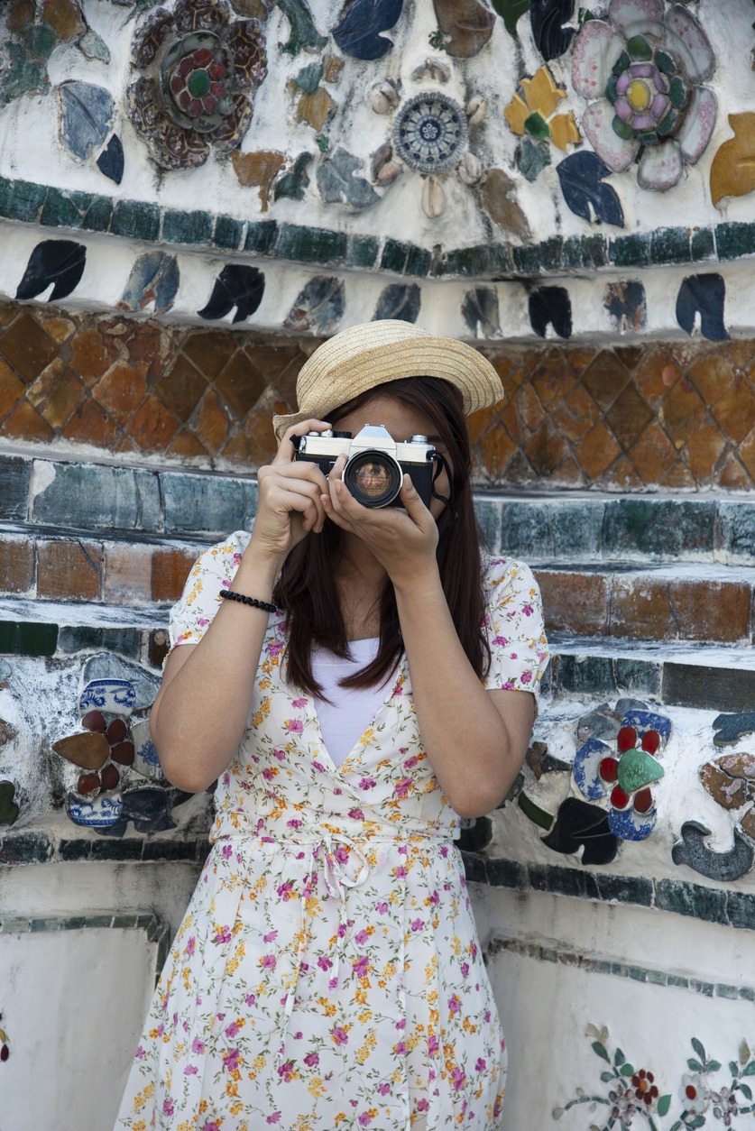 A woman taking photos