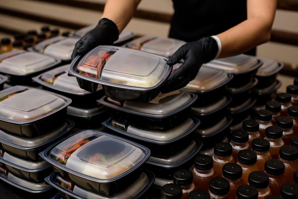 Lunch box with food in the hand