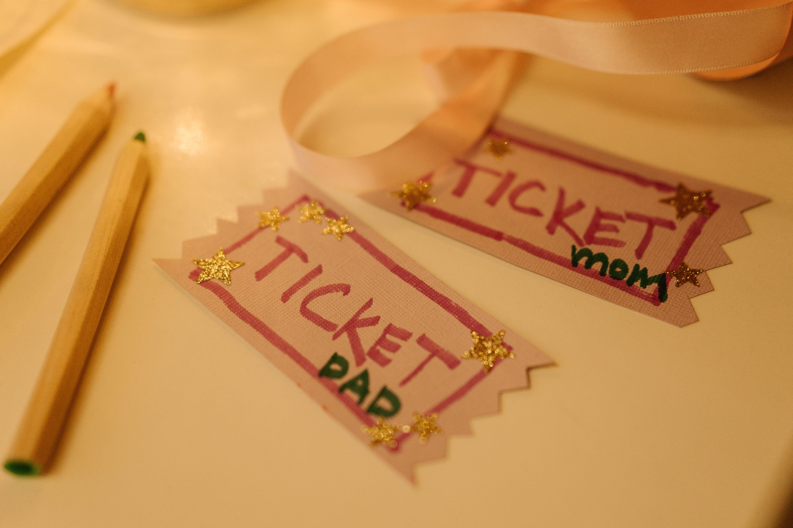 ticket-inspired invitations on the table