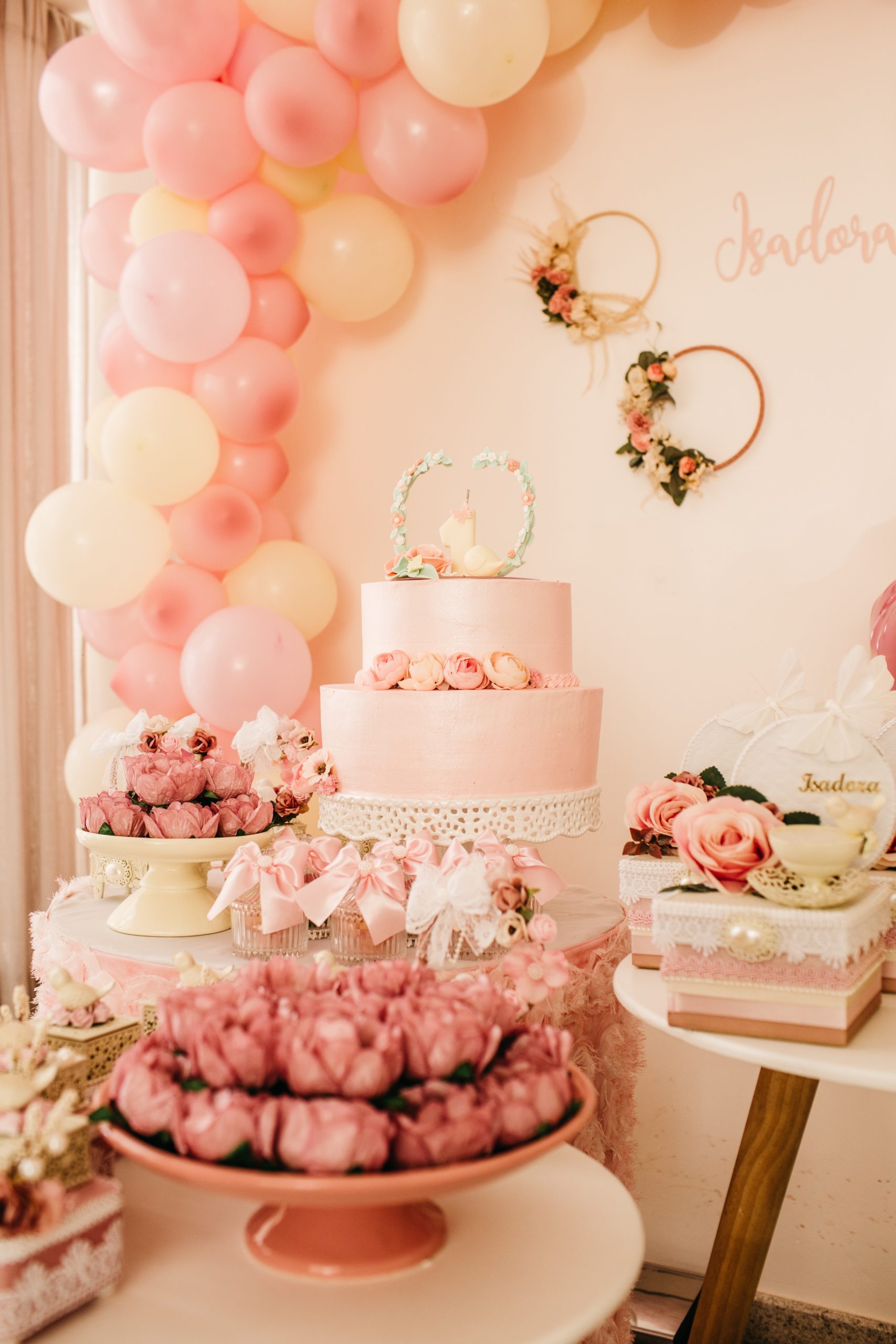 Pink-themed party with tasty and cute food on the table