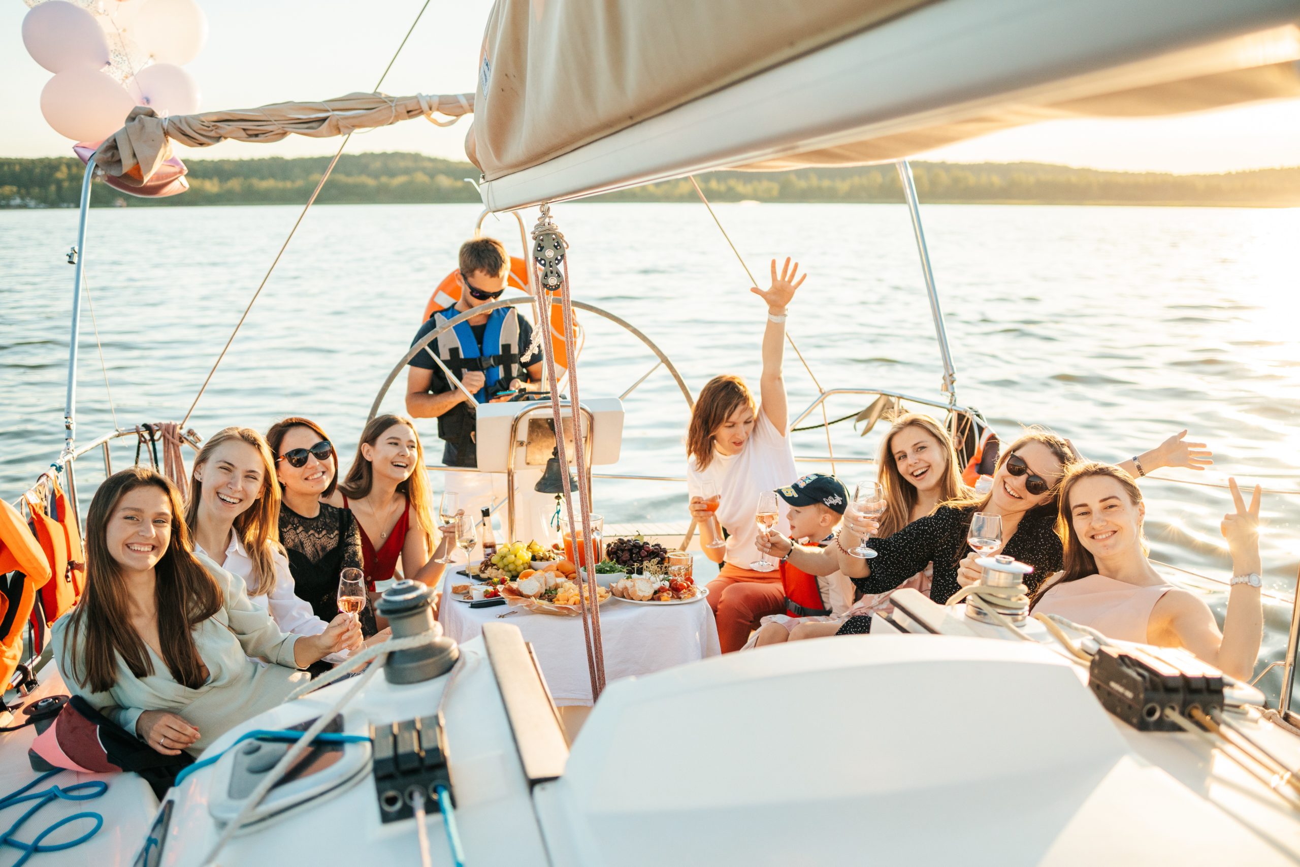 group of people enjoy a meal on a boat