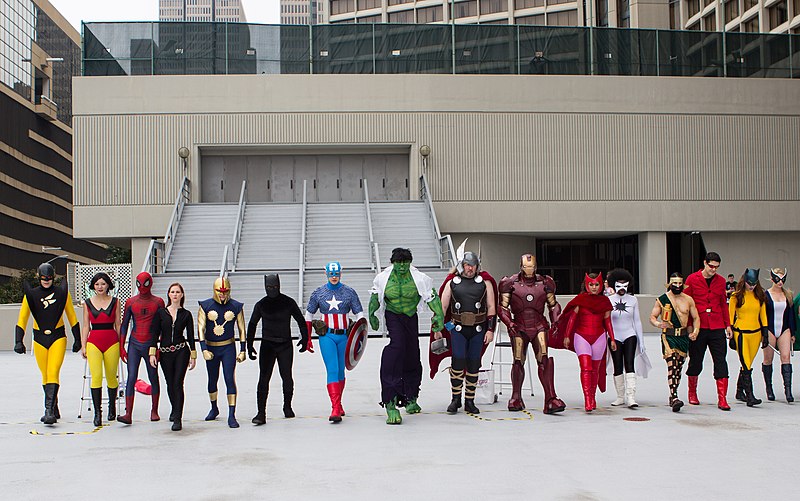 Cosplayers wearing Avengers costumes. 