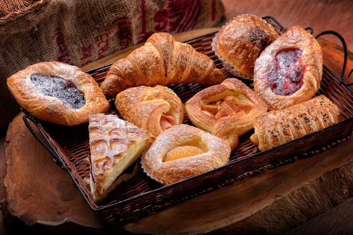 Selection of French & Danish pastries on a Wicker basket