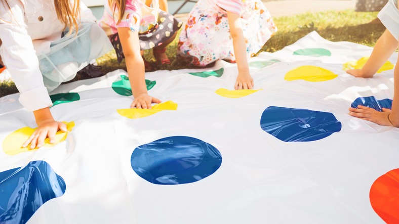 Children playing a game of Twister