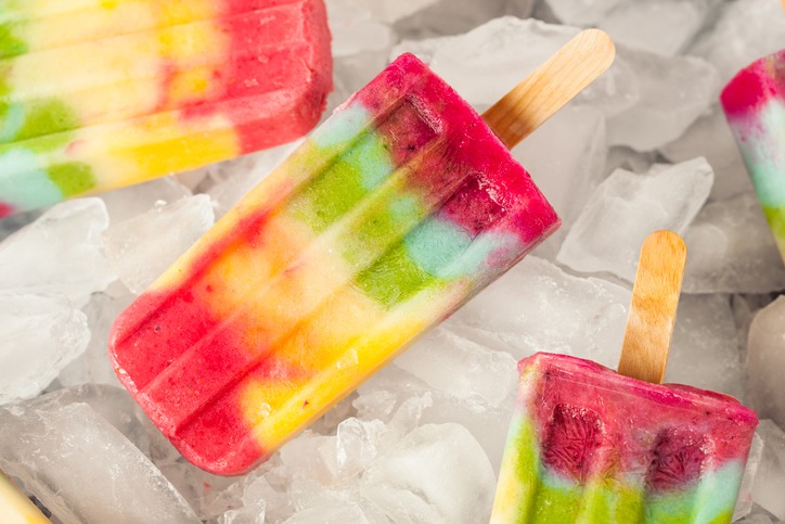 Homemade rainbow popsicles made of fruits