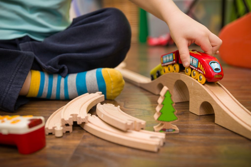 A-child-playing-with-toy-trains-1024x683