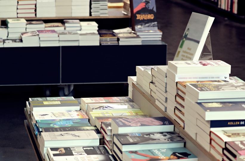 a stack of books displayed on tables