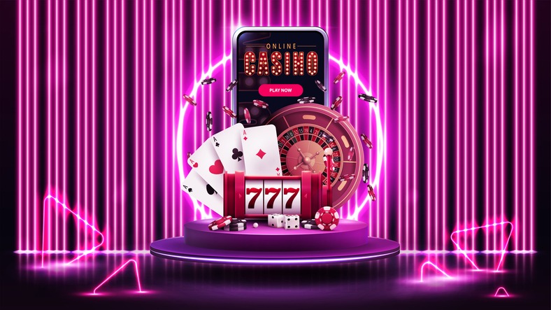Online casino, banner with smartphone, slot machine, Roulette, chips and playing cards on purple podium with neon ring in scene with line neon pink wall on background and neon triangles around
