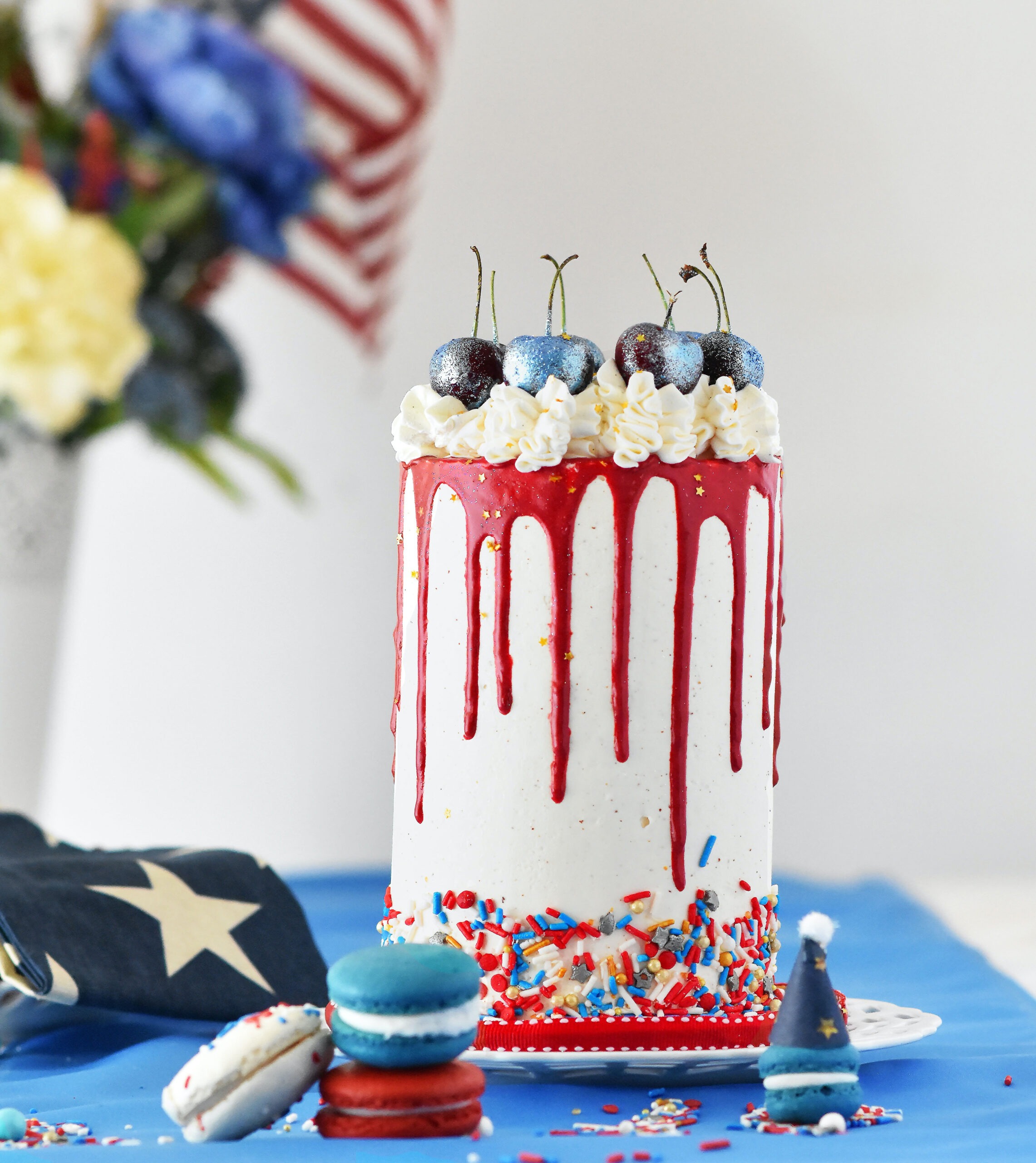 Drip cake with red and blue sprinkles