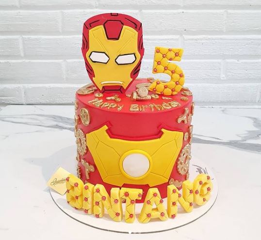 one layer red and yellow Iron Man-designed cake