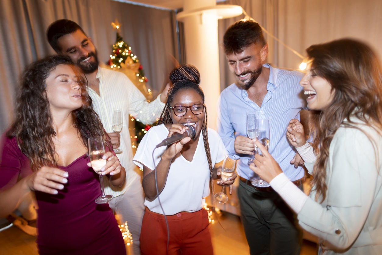 Group of cheerful young friends having fun at New Year's Eve party
