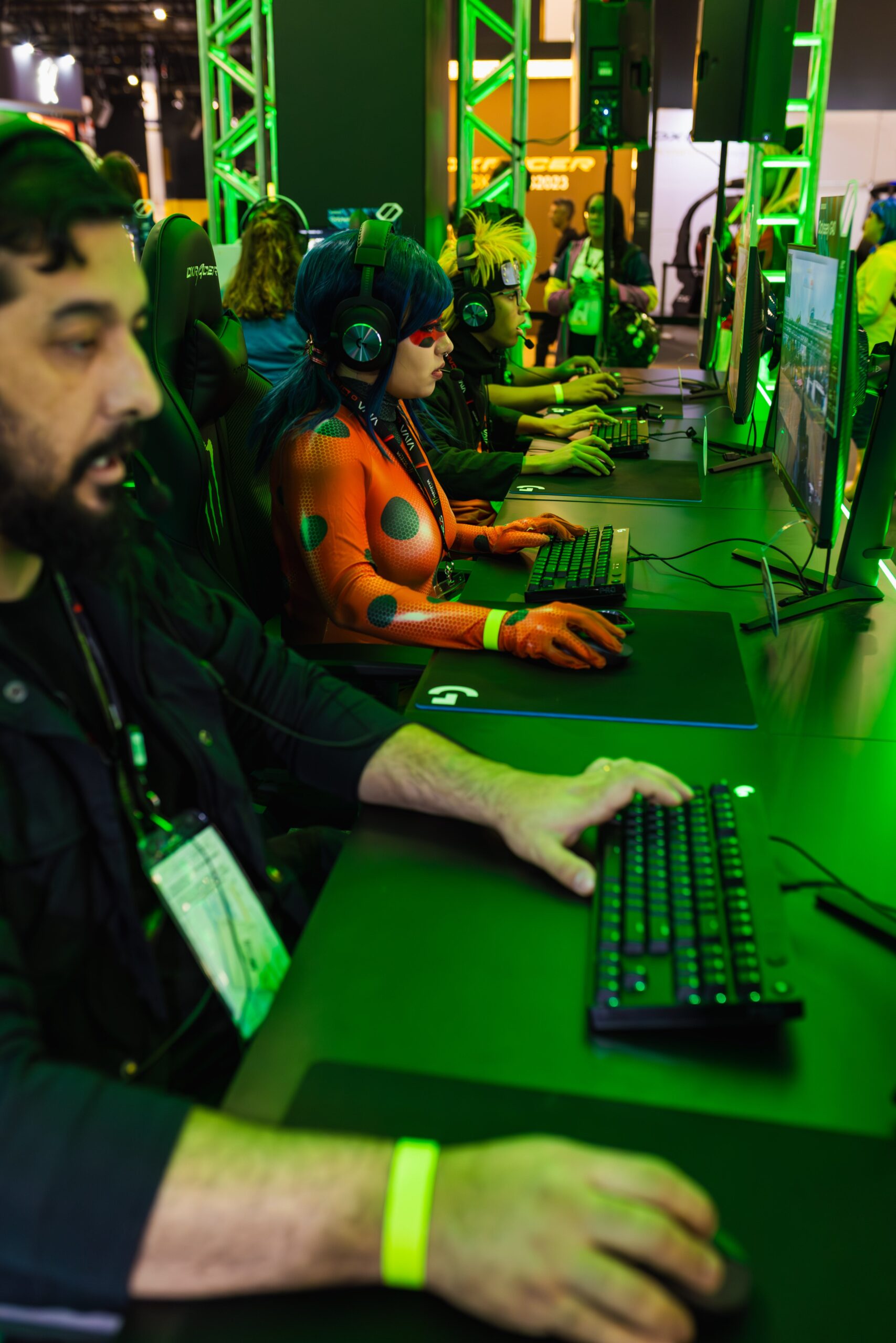 Cosplayers Gaming at a Computer Fair