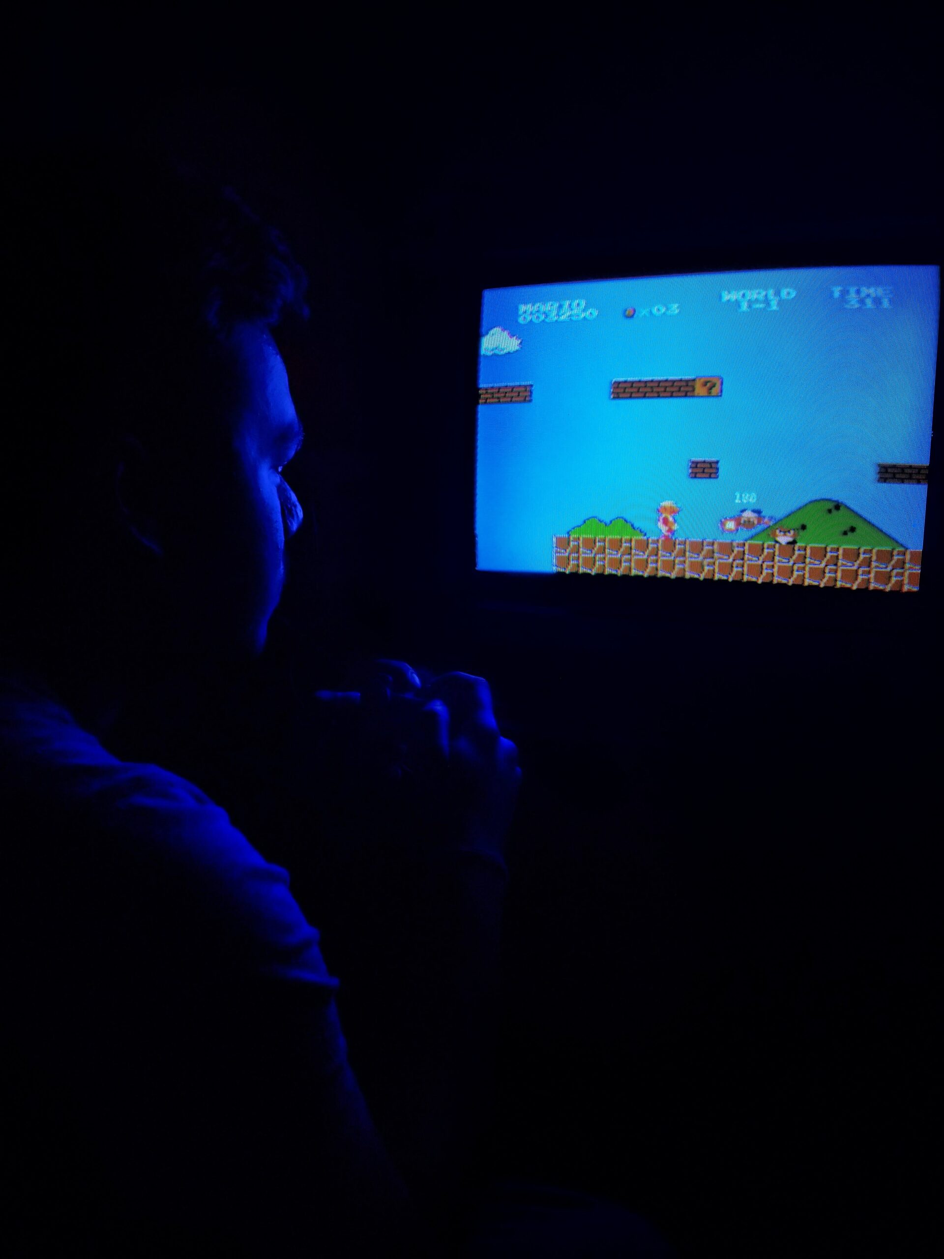 Man Playing Super Mario Bros