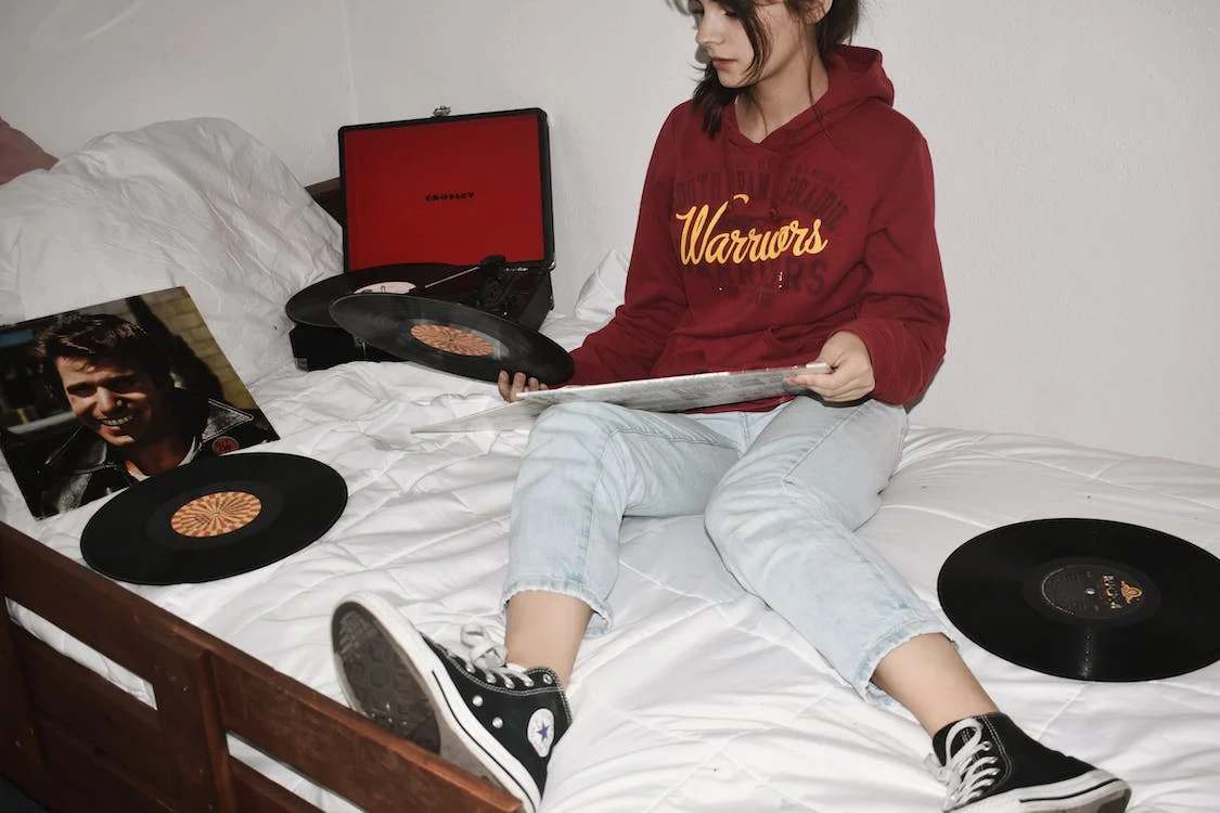 Woman with vinyl records