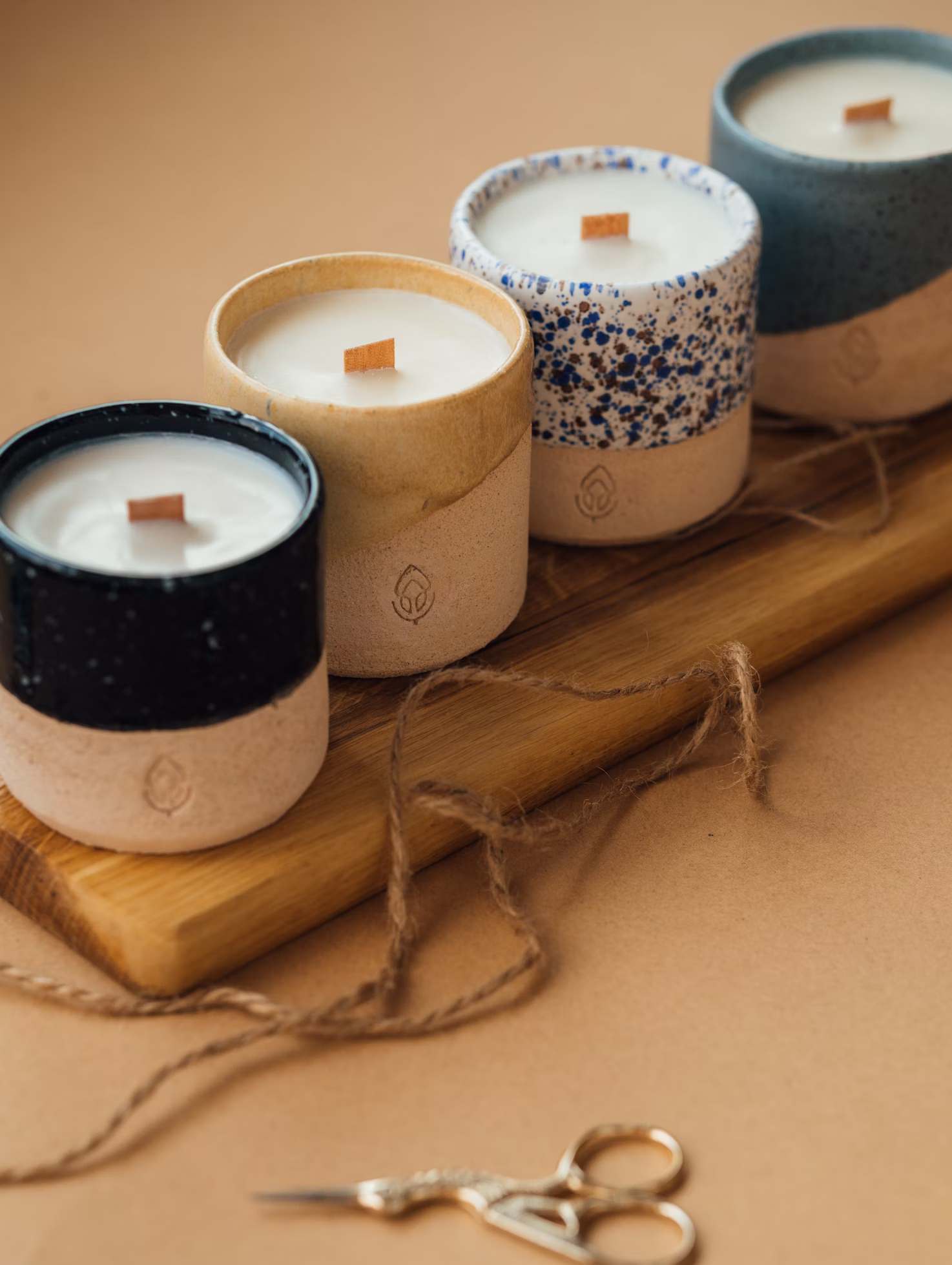 Scented candles on wooden chair