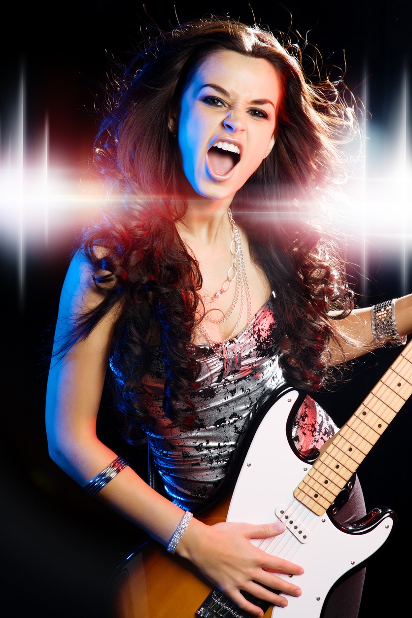 Woman playing lead guitar